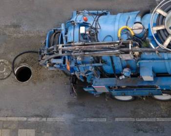 top view of sewer cleaning vacuum truck. Selective Focus Vehicle. On Street.